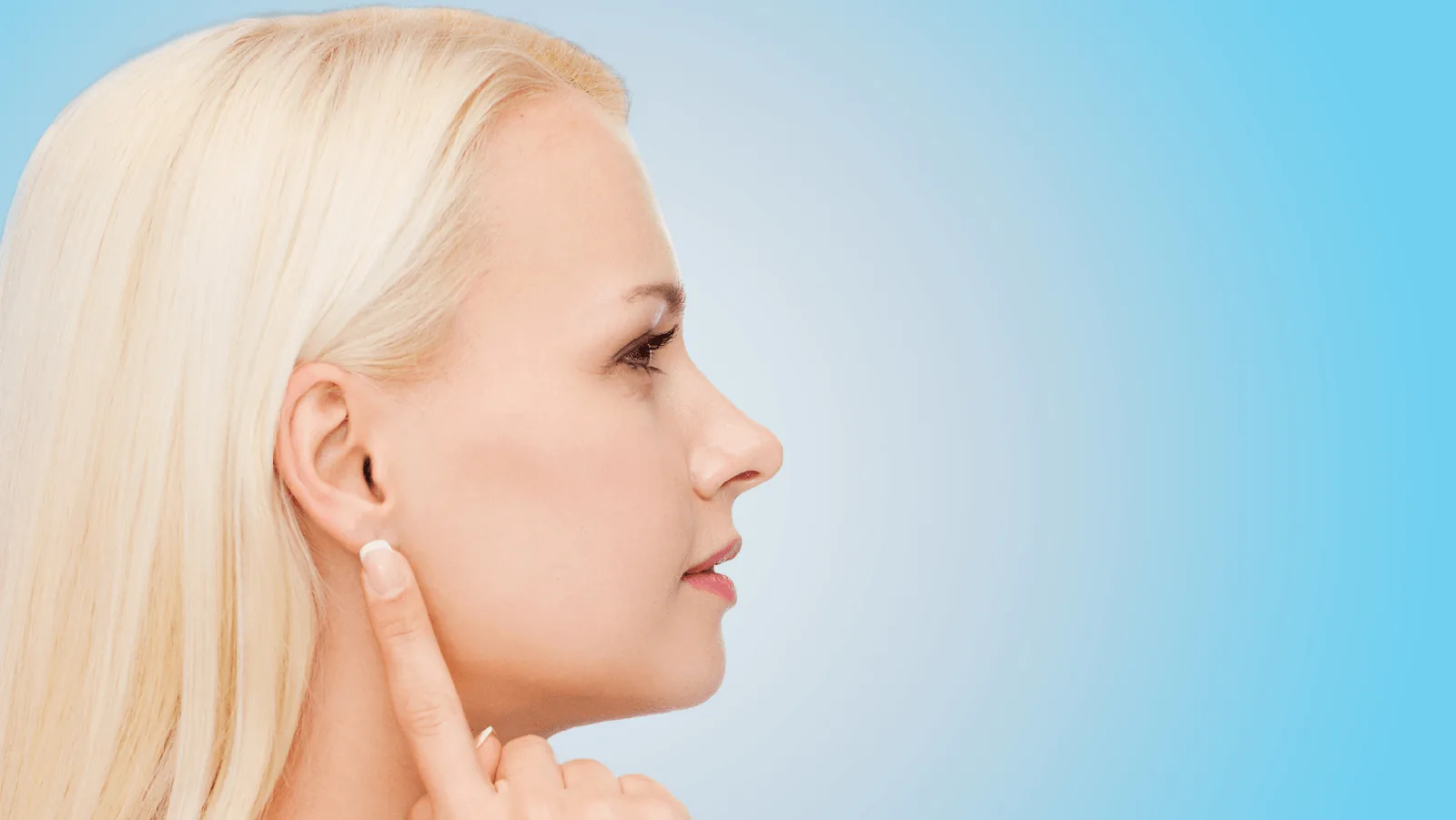 Woman touching her ear, indicating concern about HVAC noises