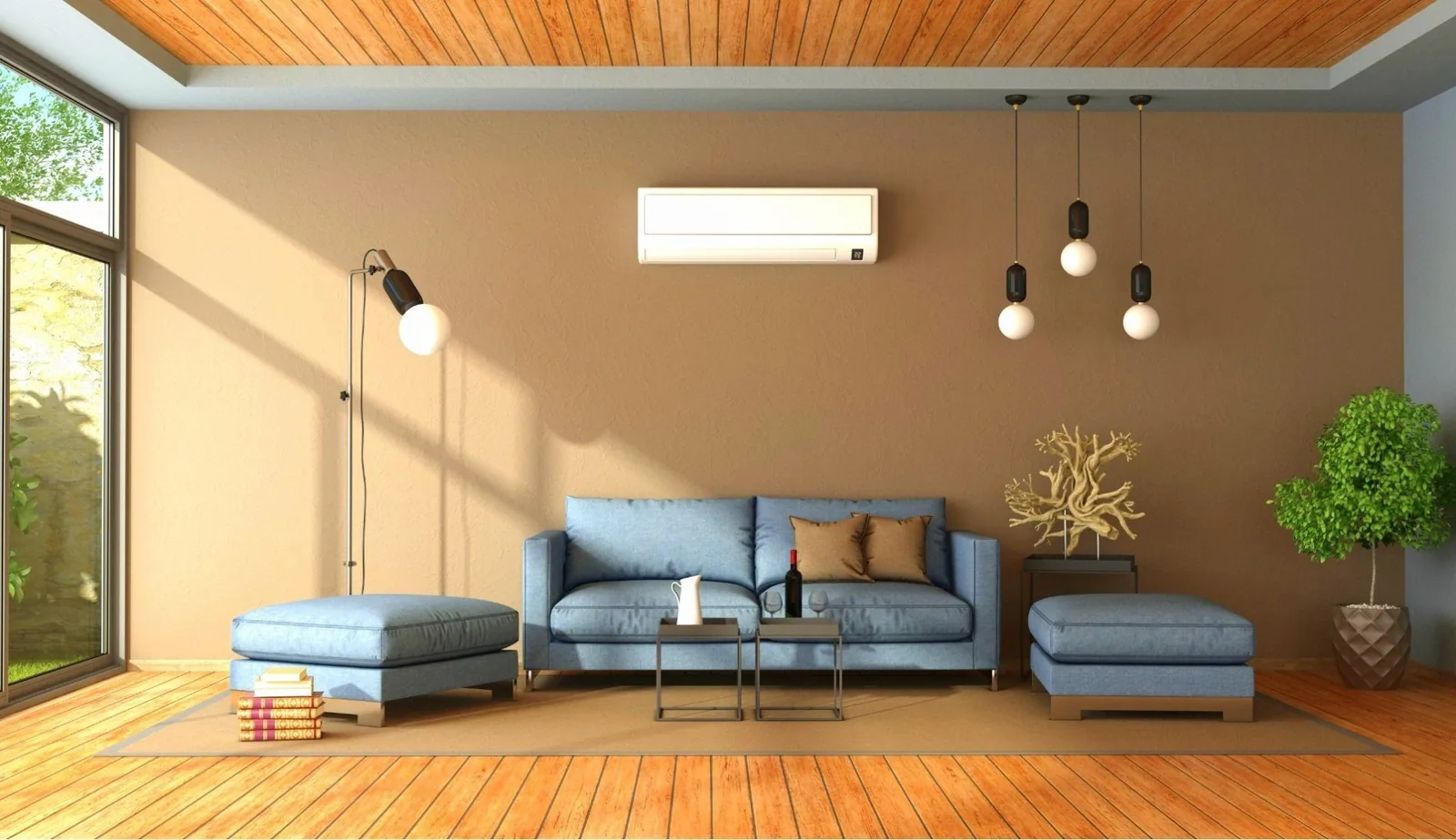 Modern living room featuring a blue sofa and ottoman, air conditioning unit on the wall, decorative lamp, and indoor